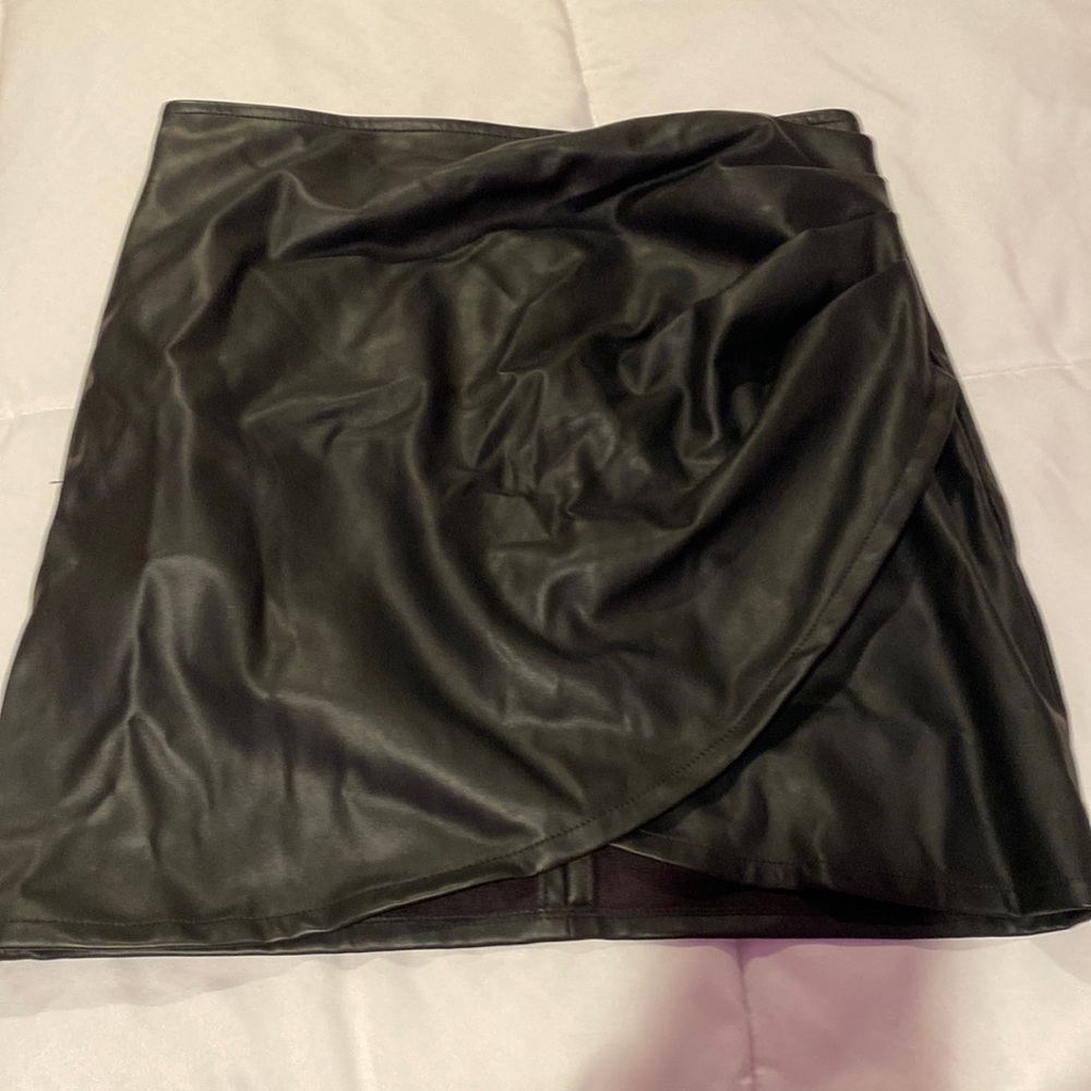 Black leather mini skirt